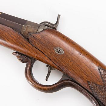 A mid 19th Century percussion rifle.