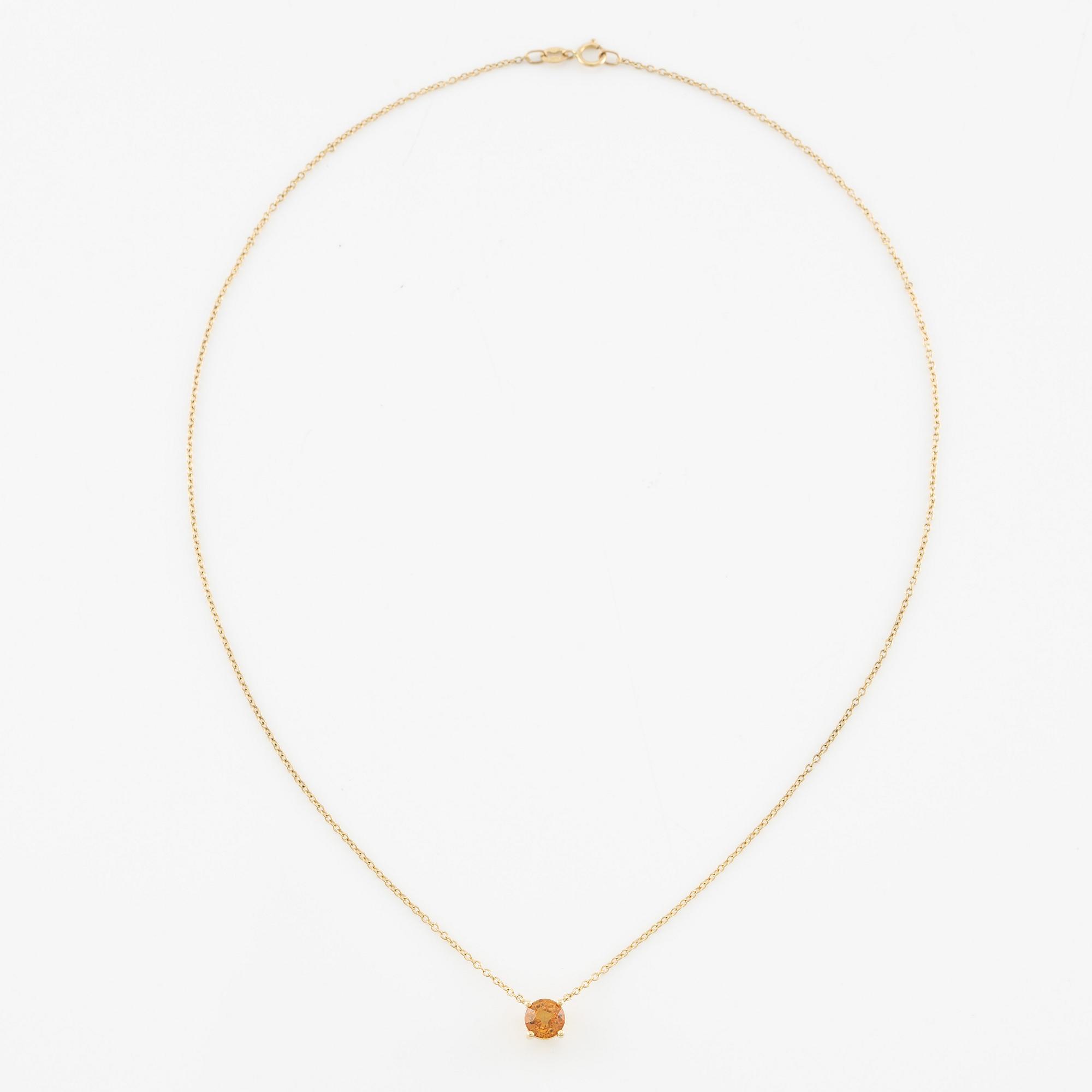 Necklace 18K gold with orange sapphire.