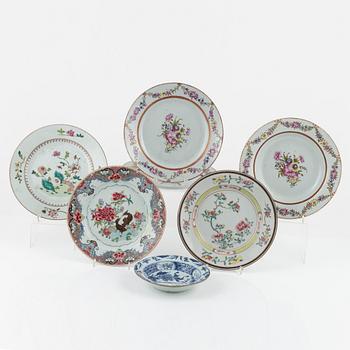 Six Famille Rose plates, and a blue and white dessert dish, China, 18th century.