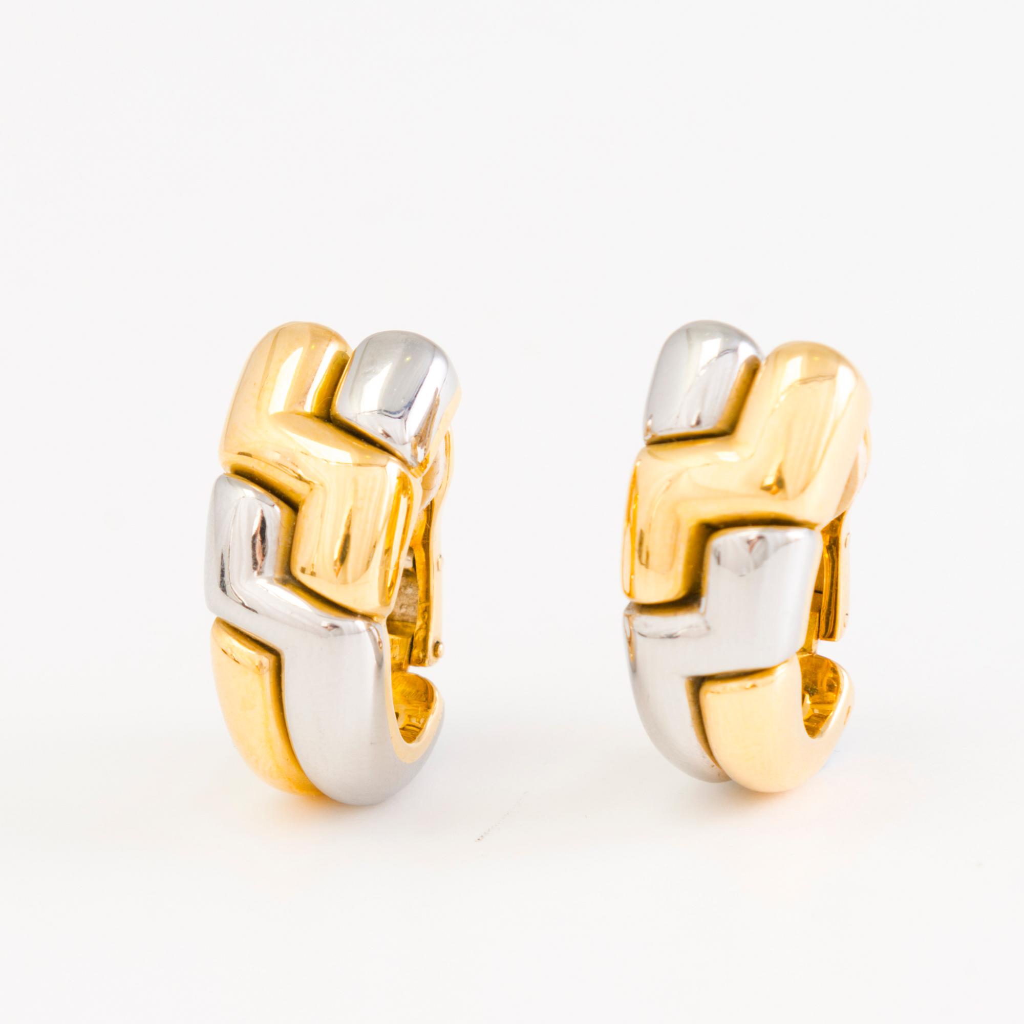 BULGARI, KORVAKORUT, 18K kultaa ja terästä.