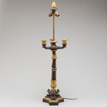 A first half of the 19th century bronze table lamp.