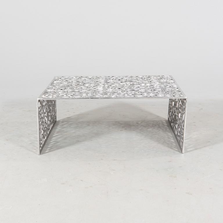 A 21st century aluminium coffee table.