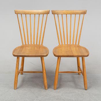 A set of eight 'Lilla Åland' birch chairs by Carl Malmsten for Stolab dated 1996.