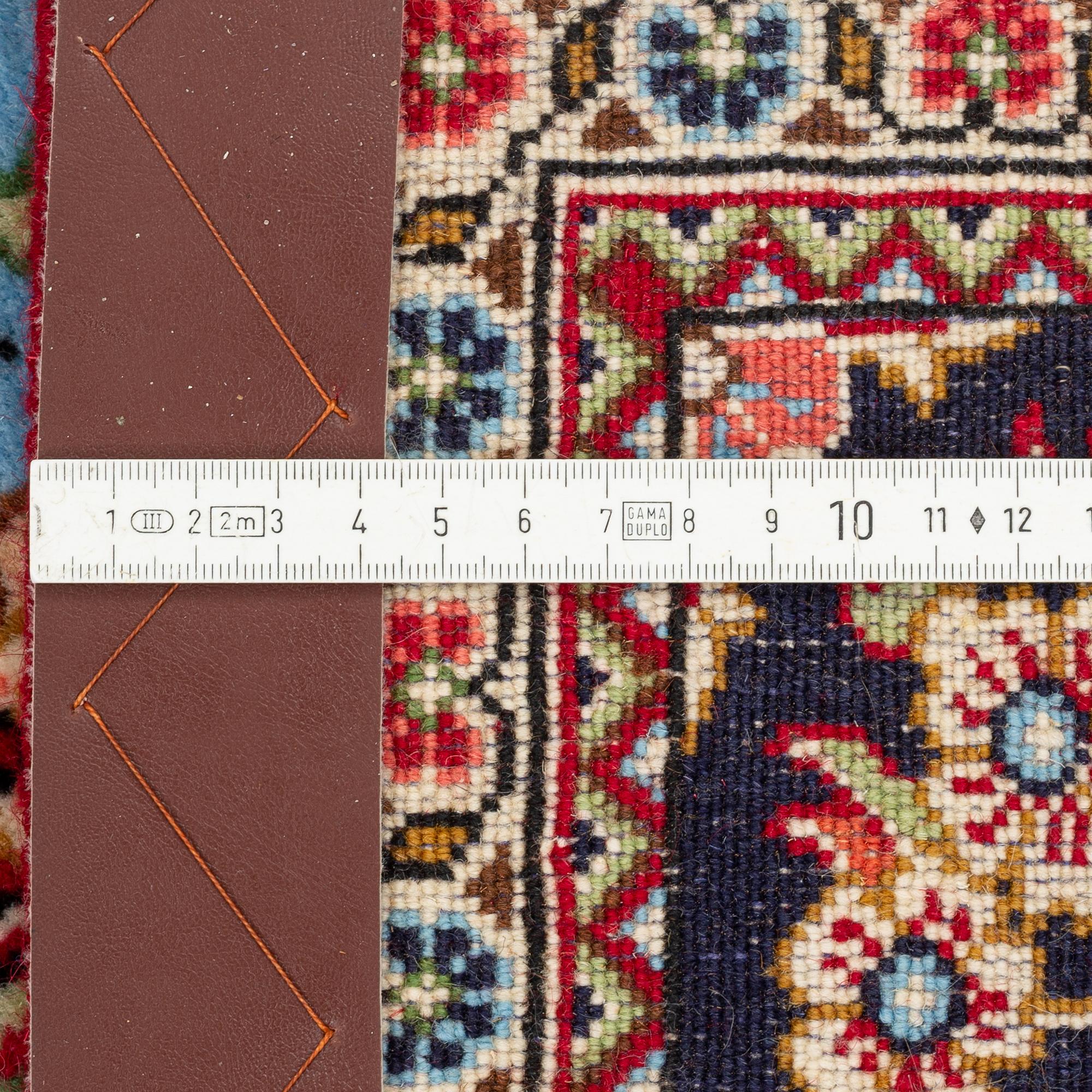 An oriental rug, c. 260 x 162 cm.