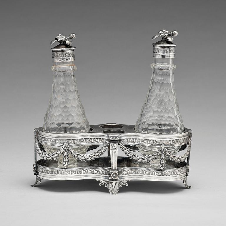 A Swedish 18th century silver and glass cruet-set, mark of Petter Eneroth, Stockholm 1780.