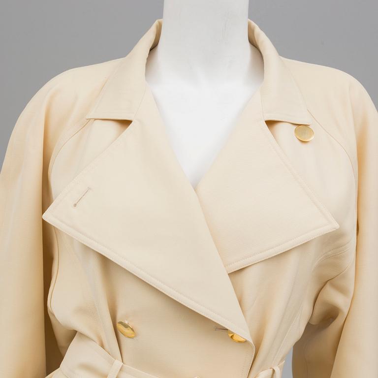 A trench-coat by Guy Laroche.