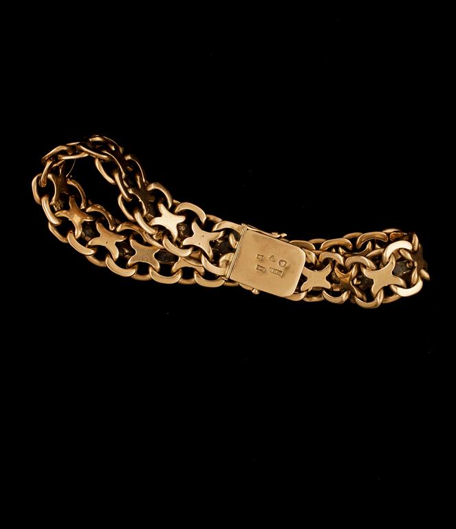 ARMBAND, 18k guld, X-länk, EHW, Stockholm, 1947. Vikt ca 43,3 g.