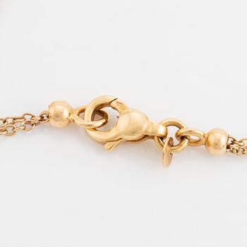 Collier 18K guld med runda briljantslipade diamanter.