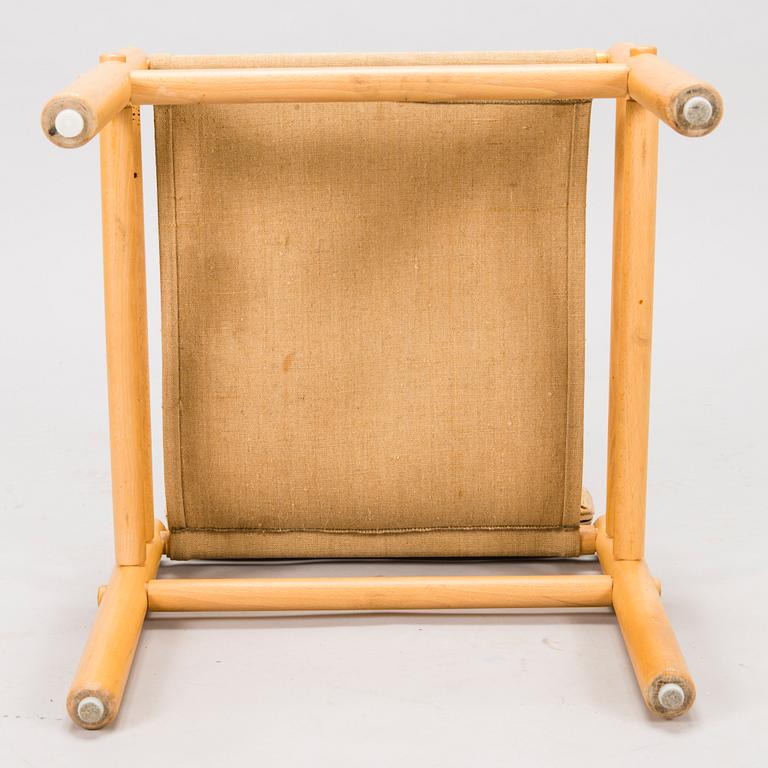 BROR BOIJE, A pair of 'Junker' easy chairs and an ottoman for Dux, Sweden, latter half of the 20th Century.
