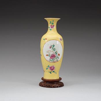A famille rose and yellow sgraffitto vase, late Qing dynasty / early Republic with Qianlong sealmark.