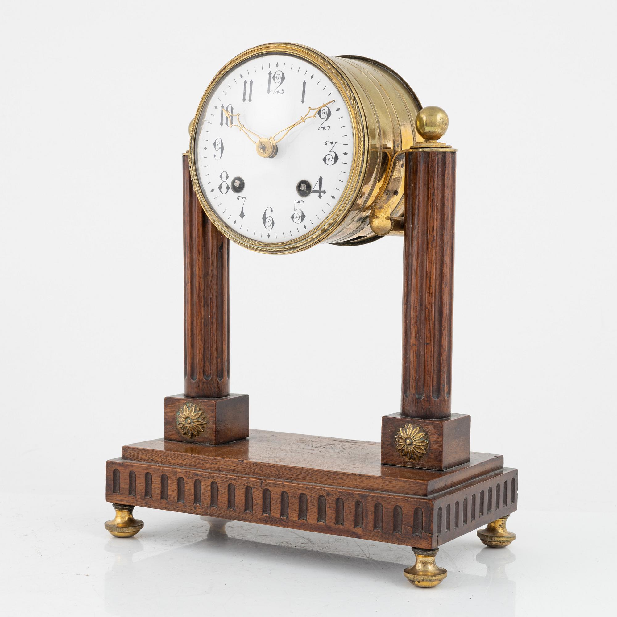A classic style mantle clock, 19th century.