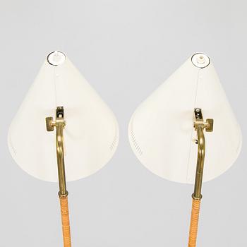 Paavo Tynell, a pair of mid-20th century K10-10 floor lamps for Taito Finland.