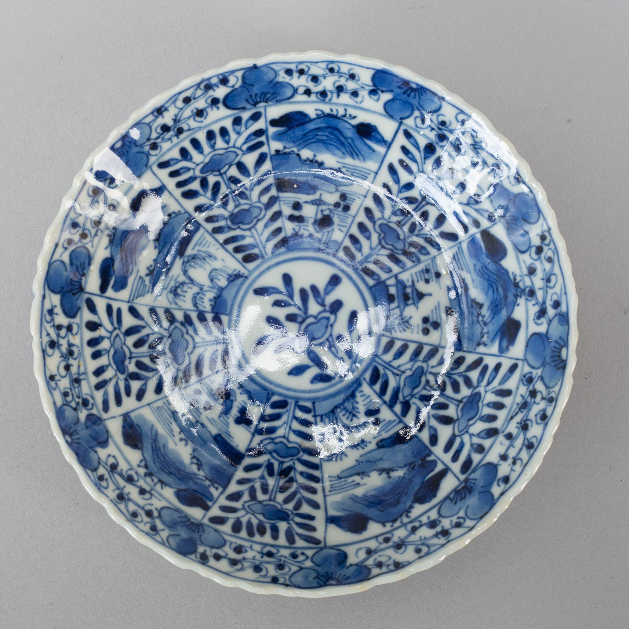 Six Chinese blue and white cups with dishes, early 20th century.