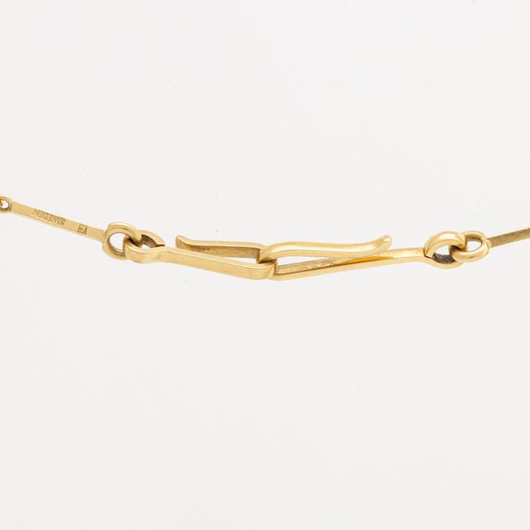 Wiwen Nilsson, halsband / fickurskedja, 18K guld, Lund 1965.