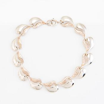 A set of sterling silver necklace and bracelet. Valo-koru, Turku.