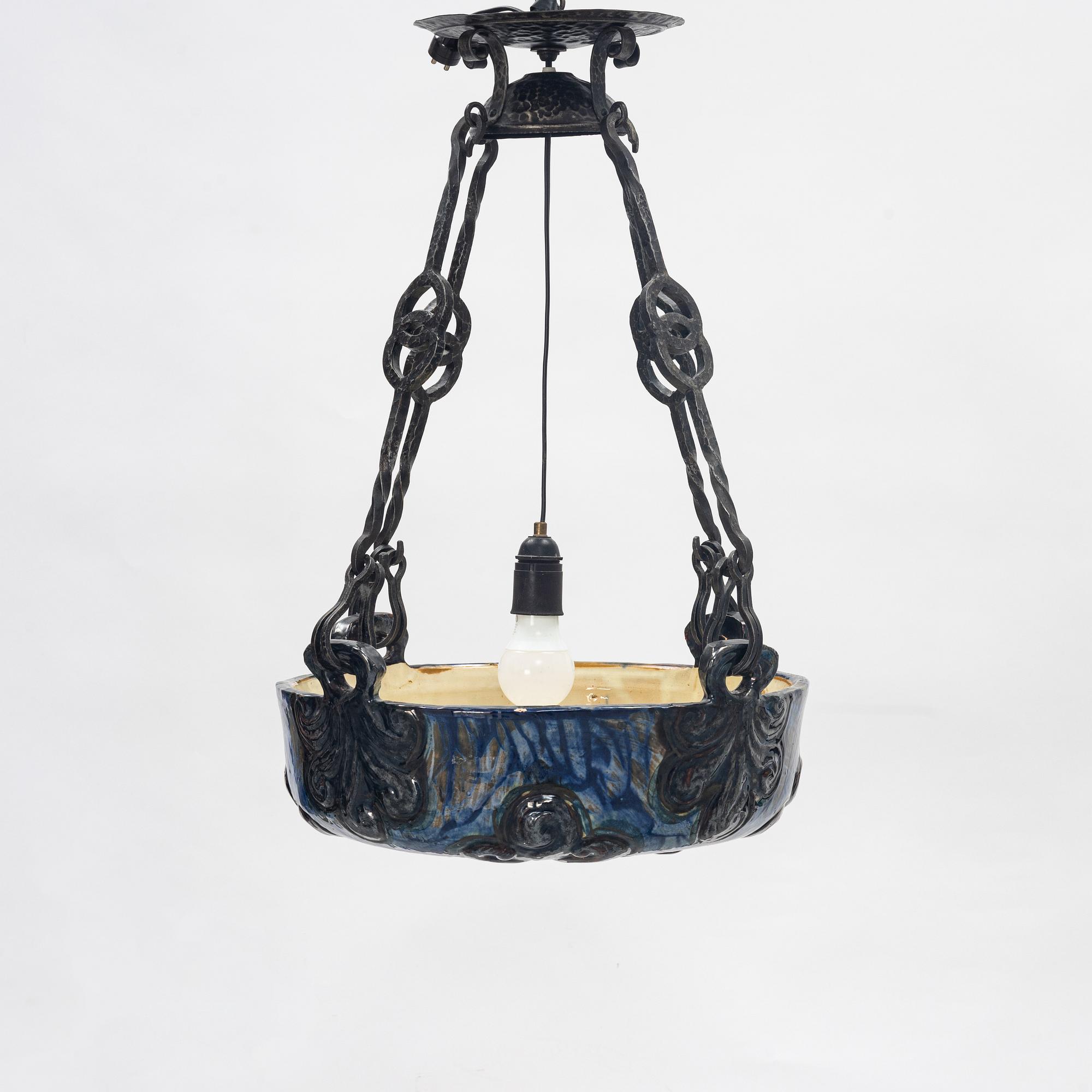 A Swedish Art Nouveau ceramic and iron ceiling light, Höganäs, early 20th century.