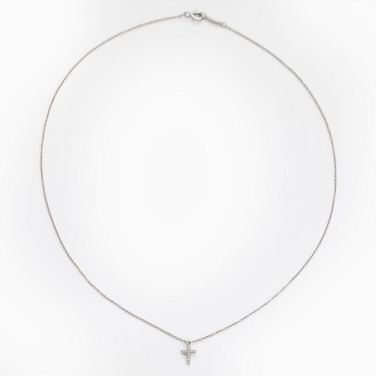 Tiffany & Co, an 18K white gold "Metro Cross" necklace with diamonds.