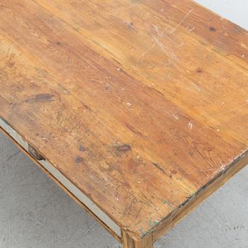 An early 20th century pine table.