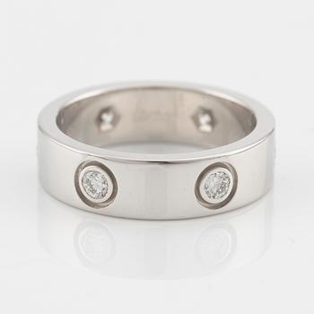 Cartier "Love" ring in 18K white gold with round brilliant-cut diamonds.