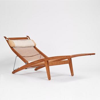 Hans J. Wegner, an oak lounge chair model "JH 524", Johannes Hansen, Copenhagen.