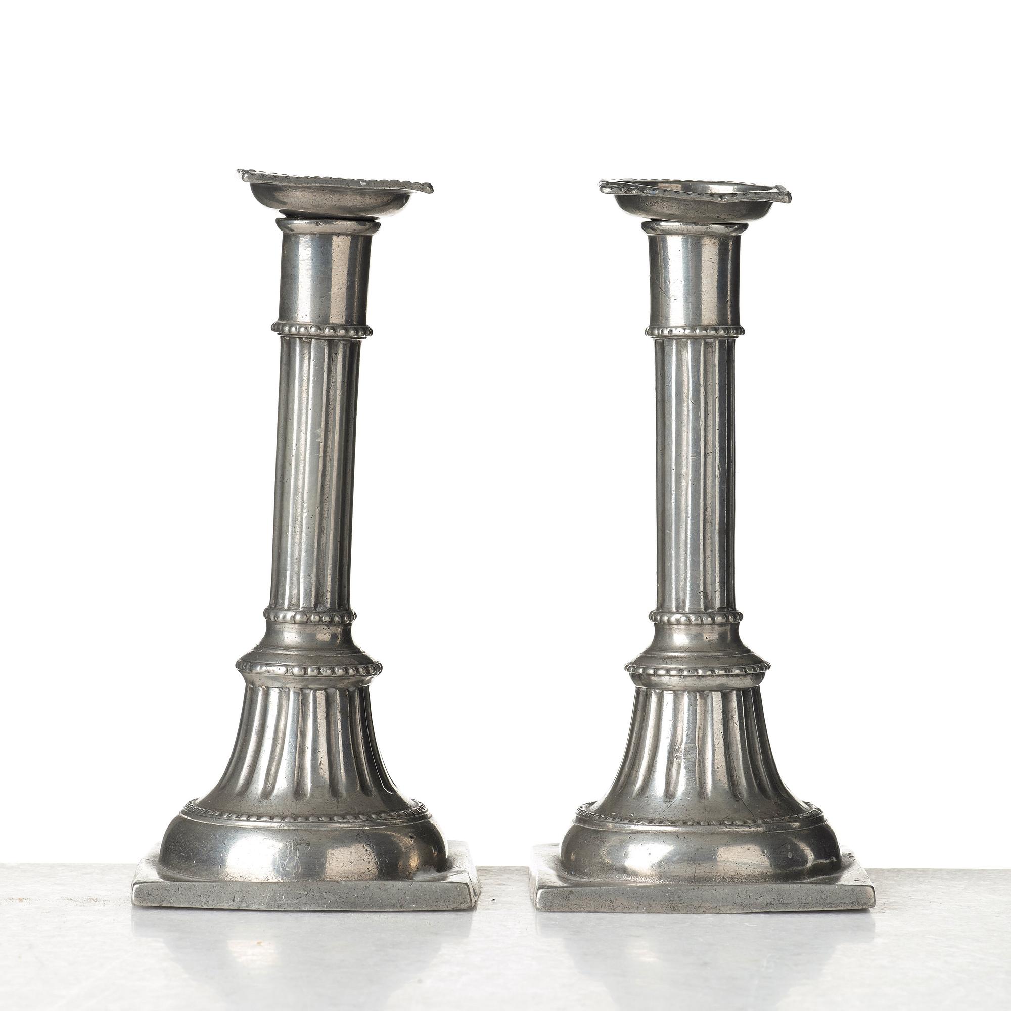 A pair of late Gustavian pewter candelsticks by Daniel Rising, Åbo 1797.