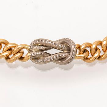 An 18K gold necklace weight 183,6 grams, 0,4 ct brilliants.