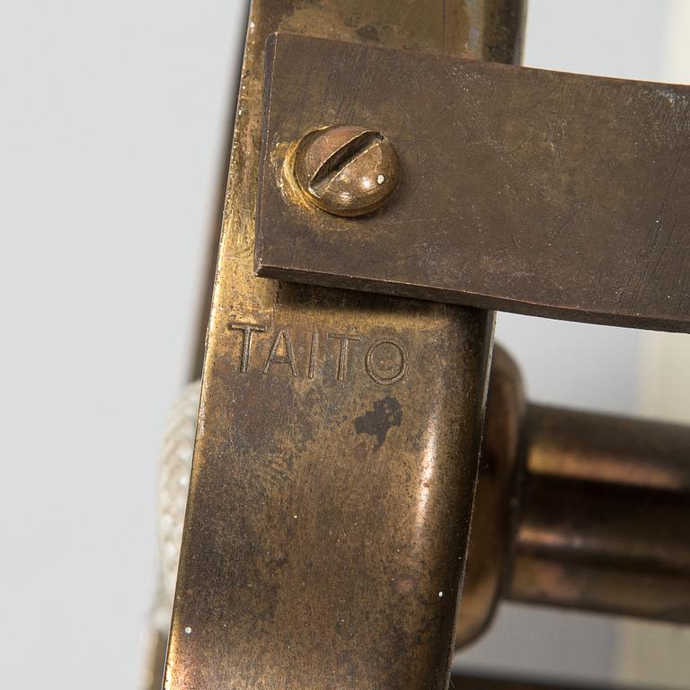 Paavo Tynell, A pair of mid-20th century '10330' wall lamps for Taito, Finland.