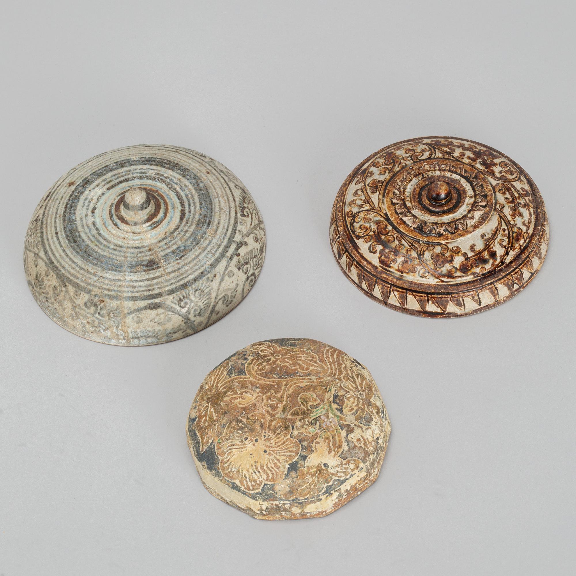 A group of three ceramic covers, including Thailand, Sawankhalok, 16th/17th century.