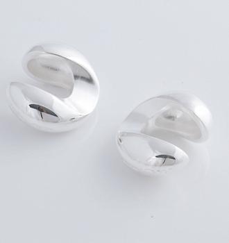 A pair of cufflink, by Ole Lynggaard.