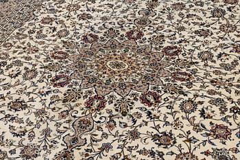 A Keshan carpet, signed, c. 405 x 290 cm.