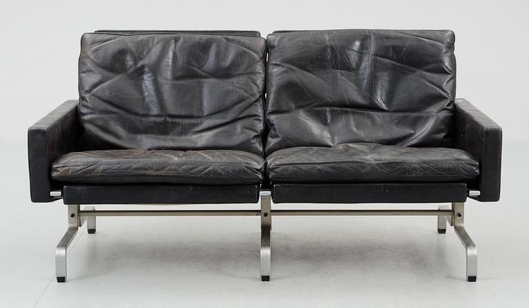 A Poul Kjaerholm black leather and steel base "PK-31-2" sofa, maker's mark E Kold Christensen, Denmark.