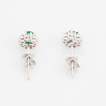 Emerald and brilliant cut diamond earrings.