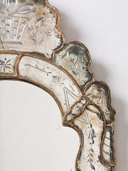 A Northern European late baroque mirror, mid 18th century.
