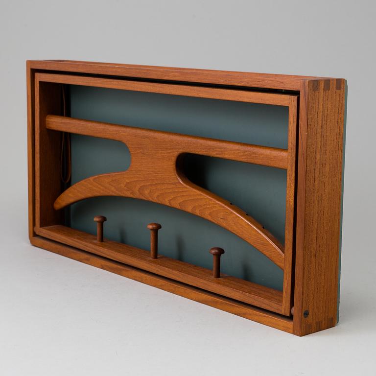 A clothes hanger by Adam Hoff & Poul Östergaard, Virum Möbelsnickeri, Denmark, mid 20th century.