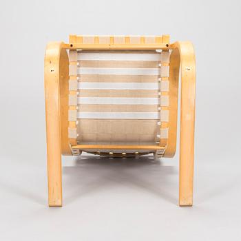 Alvar Aalto, a 1980s Artek 406 armchair.