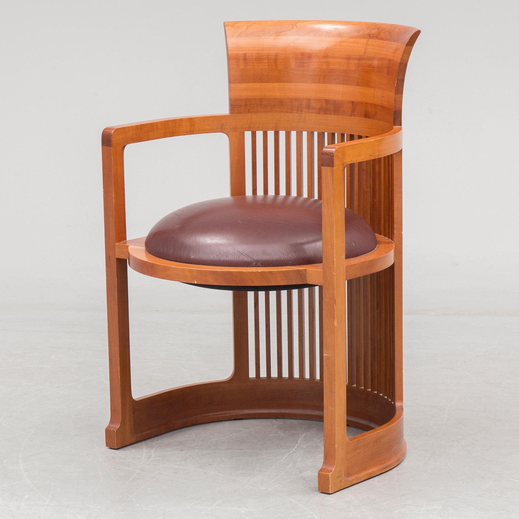 FRANK LLOYD WRIGHT, A cherry wood 'Barrel chair' from Cassina, late 20th century.