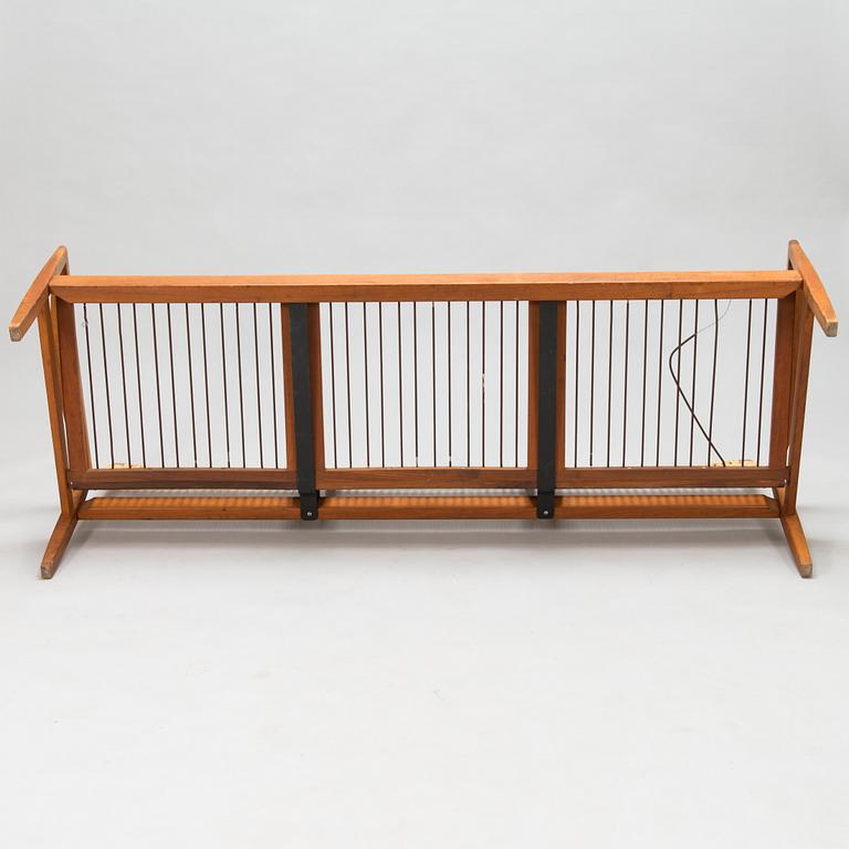 Hans Olsen, A teak and rattan sofa for Juul Kristensen, Denmark, late 1950s.