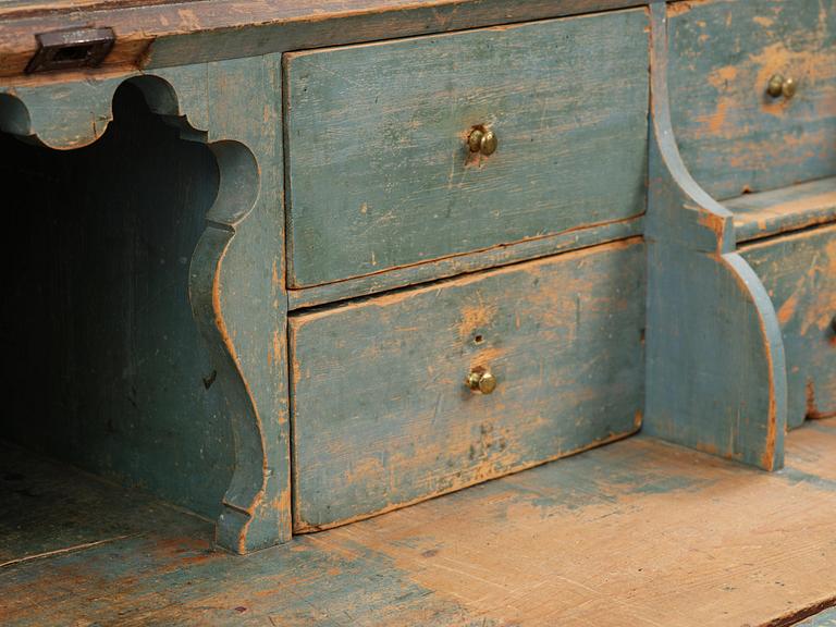 A polychrome-painted folk art cabinet from Värmland, Sweden, dated 1818.