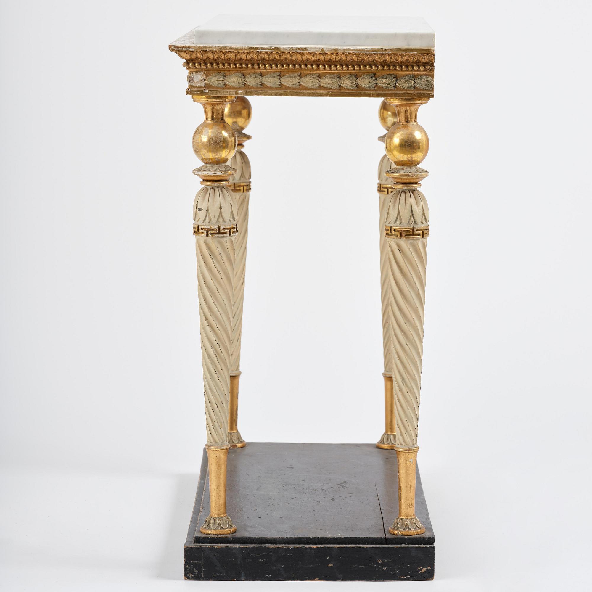 A late Gustavian giltwood console table attributed to Hedberg & Lindblad (active in Stockholm 1802-05).