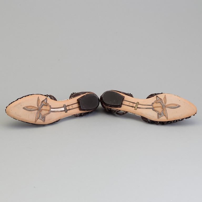 a pair of sandals by Goirgio armani, in size 40.