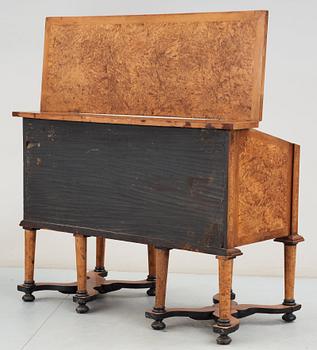 A Swedish late Baroque 18th century writing desk with fall front.