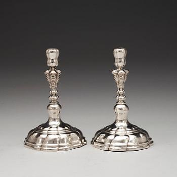 A pair of German mid 18th century silver candlesticks, possibly of Carl David Schröder, Dresden 1750-1775.