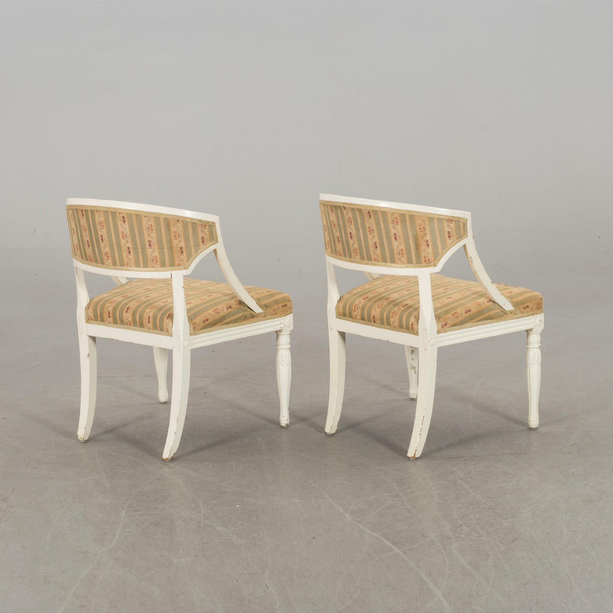 a pair of 19th century armchairs.
