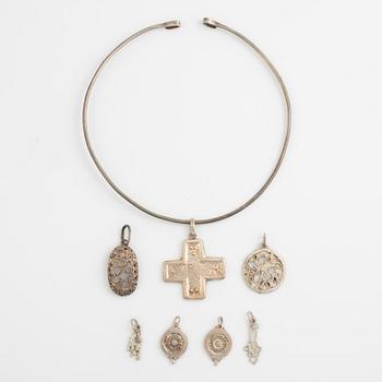 Lars Arby, a neck ring and seven pendants, silver, Gothenburg 1966, 1977 and 1982.