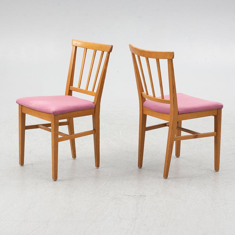 Carl Malmsten, dining table and four chairs, including Svensk Fur, second half of the 20th century.