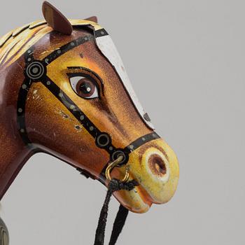 A mid 20th century tin toy horse and carriage, Cragston Toy, Japan.