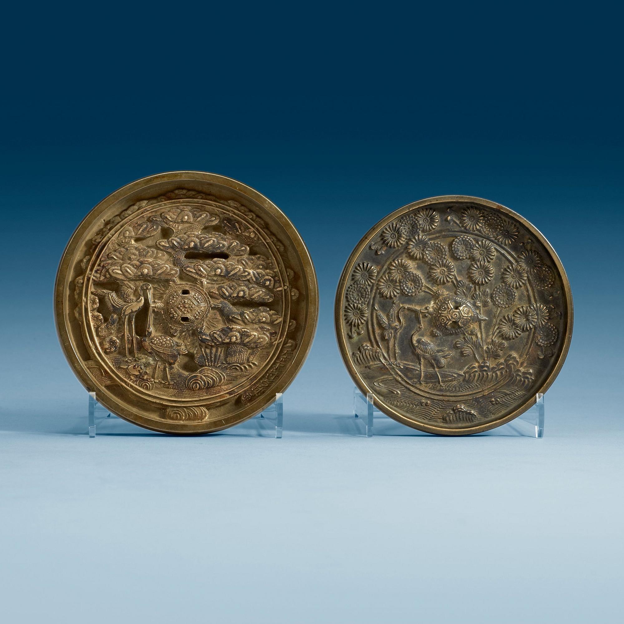 Two bronze mirrors, late Qing dynasty.