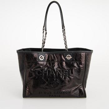 CHANEL, A Large Black Leather Shopping Bag.