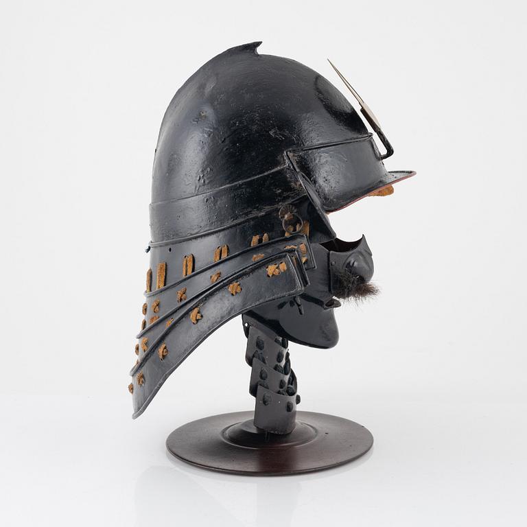 A Kabuto helmet with yoroi mask, Edo (1603-1868).