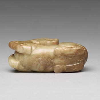 A carved nephrite figure, Ming dynasty (1368-1644).